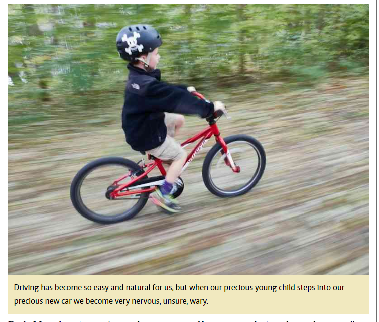 Raising a child riding a bike
